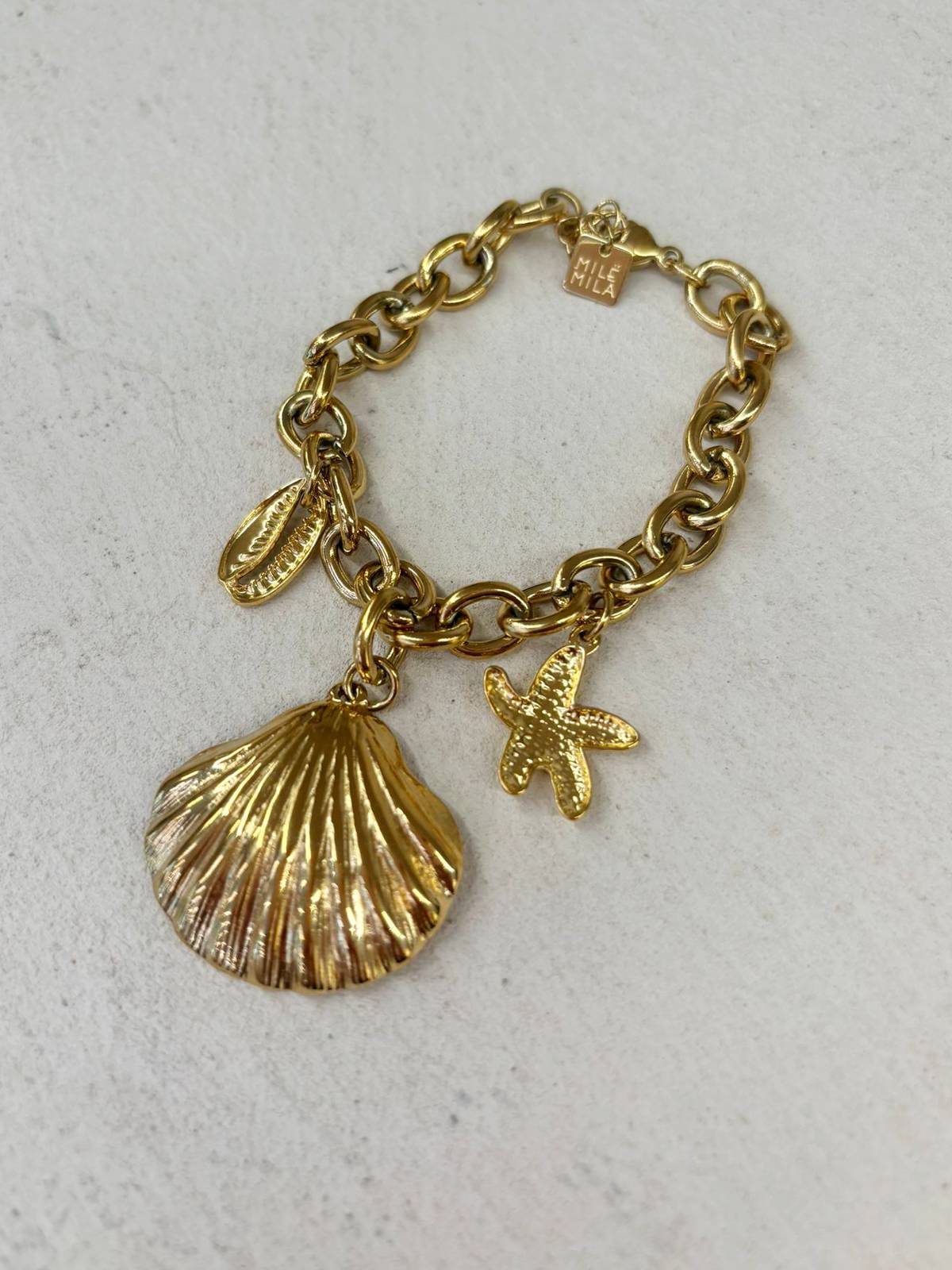 PULSERA CONCHA DORADO