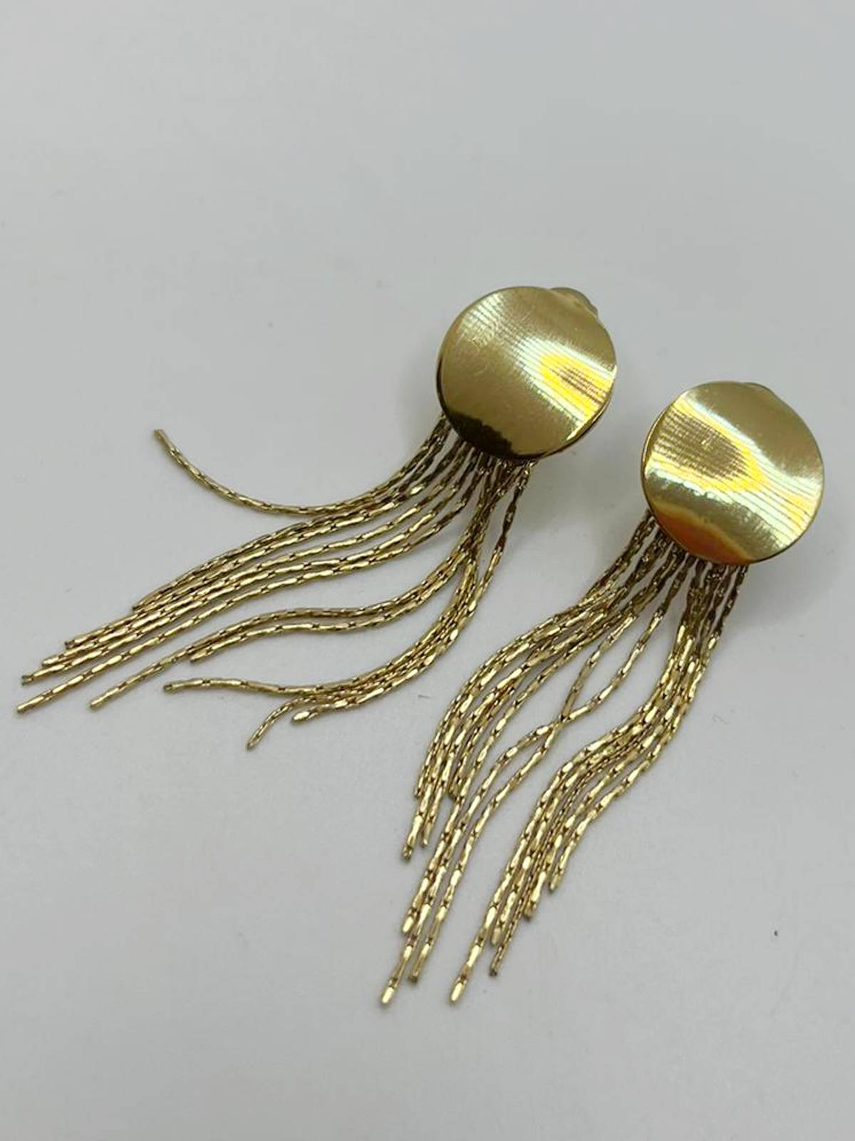 PENDIENTES FLECOS CÍRCULO DORADO